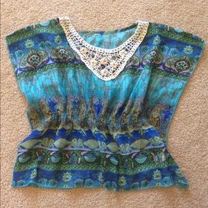 Girls blouse with crocheted neckline